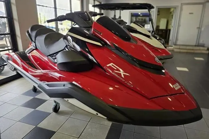 Slide: The Image of 2026 Yamaha WaveRunner FX Cruiser HO in showroom, red and black design. - 8