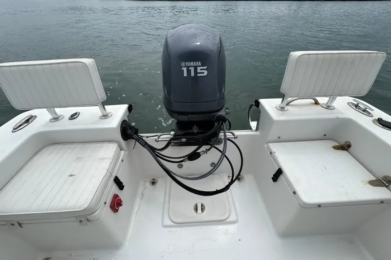Slide: The Image of 2009 KenCraft 2060 boat with Yamaha 115 outboard motor on calm water. - 20