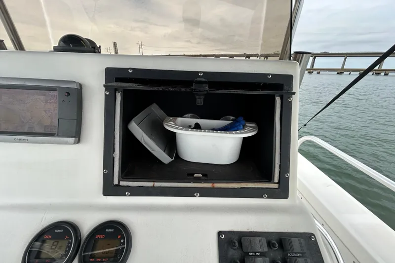 Slide: The Image of KenCraft 2060 boat dashboard with storage compartment and Garmin GPS, 2009 model. - 28