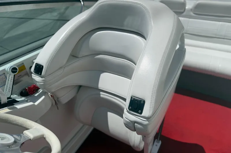 Slide: The Image of White leather seat in a 2001 Formula 353 FASTech boat cockpit. - 18