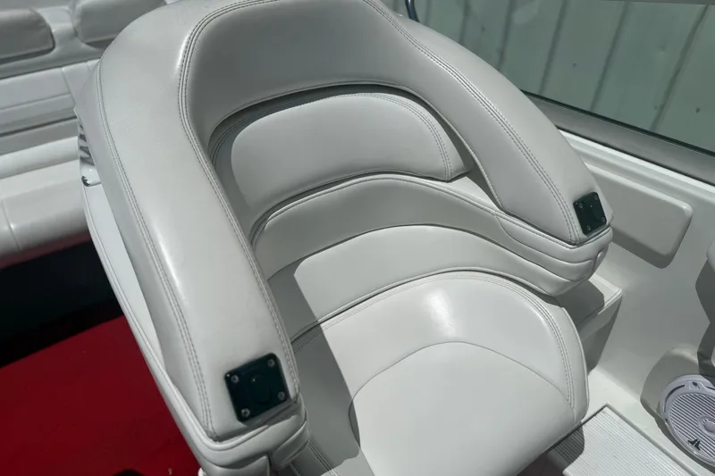 Slide: The Image of White leather seat in a 2001 Formula 353 FASTech boat interior. - 20