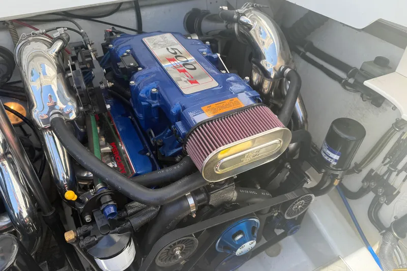 Slide: The Image of Engine of a 2001 Formula 353 FASTech boat, featuring a Mercury 500 EFI motor. - 23