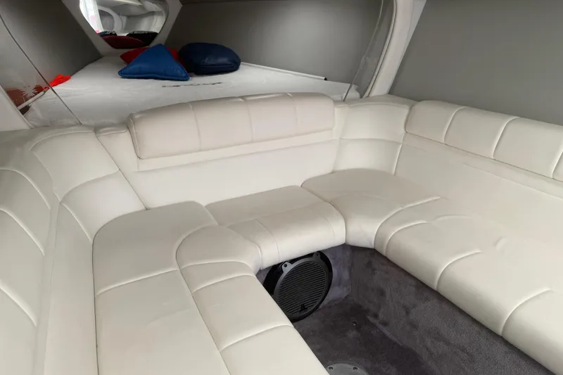 Slide: The Image of Interior of 2001 Formula 353 FASTech boat with white leather seating and cozy cabin space. - 25