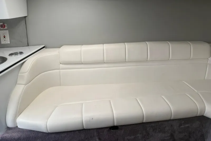 Slide: The Image of Interior of 2001 Formula 353 FASTech boat with white leather seating. - 27