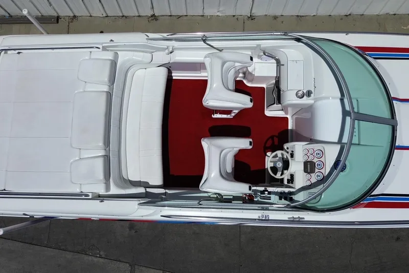Slide: The Image of Overhead view of 2001 Formula 353 FASTech boat interior with red carpet and white seating. - 35
