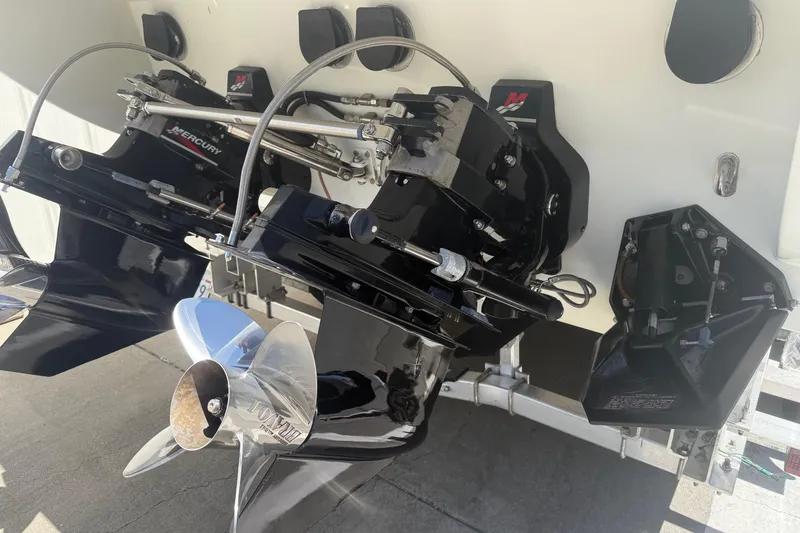 Slide: The Image of 2001 Formula 353 FASTech boat with dual Mercury outboard engines and polished propellers. - 6