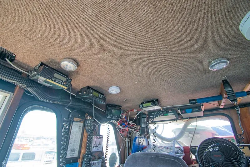 Slide: The Image of Interior of 1975 Blanchard Passenger Sportfisher with electronic equipment and wiring. - 10