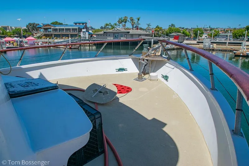 Slide: The Image of 1975 Blanchard Passenger Sportfisher boat deck with marina view. - 15