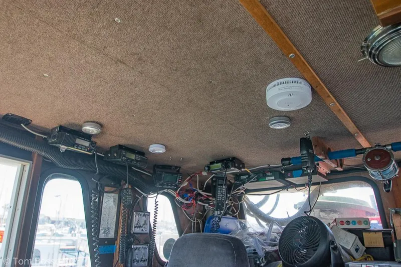 Slide: The Image of Interior of a 1975 Blanchard Passenger Sportfisher boat with electronic equipment and wiring. - 8