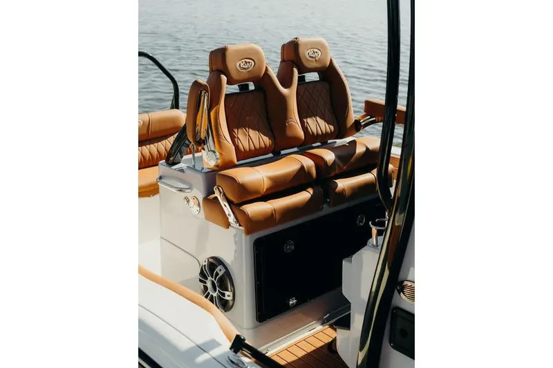 Slide: The Image of Luxurious seating on 2026 Key West 239 FSR boat with brown leather upholstery. - 13