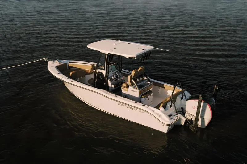 Slide: The Image of 2026 Key West 239 FSR boat on calm water, featuring sleek design and modern amenities. - 28