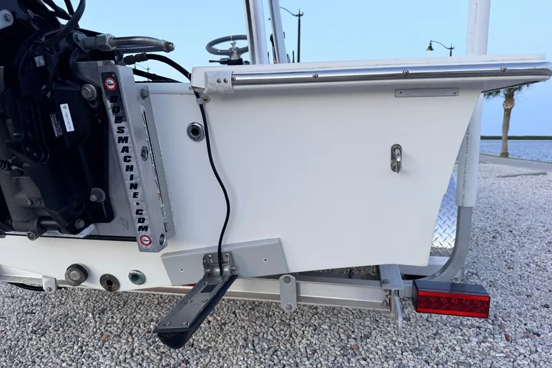 Slide: The Image of 2019 Mitzi Skiffs 17 boat transom with motor mount and trailer details. - 19