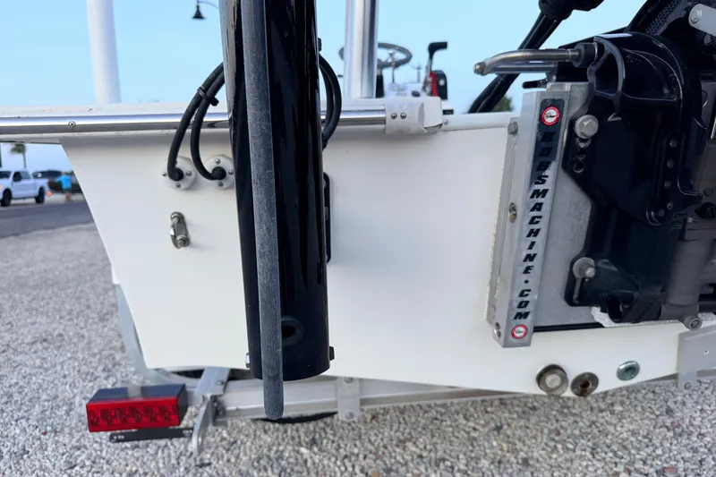 Slide: The Image of 2019 Mitzi Skiffs 17 boat transom with motor mount and trailer detail. - 22