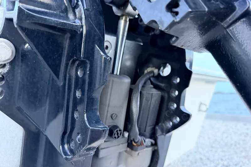 Slide: The Image of Close-up of a 2019 Mitzi Skiffs 17 boat engine component. - 27