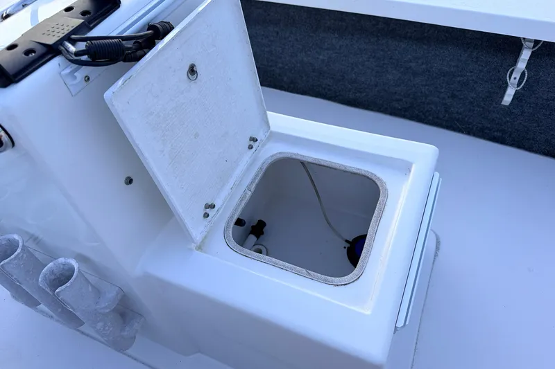 Slide: The Image of Open storage compartment on a 2019 Mitzi Skiffs 17 boat. - 46