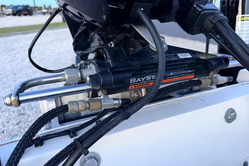 Slide: The Image of BayStar hydraulic steering system on a 2019 Mitzi Skiffs 17 boat. - 66