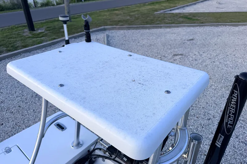 Slide: The Image of 2019 Mitzi Skiffs 17 boat platform with Power-Pole anchor system in a gravel area. - 70