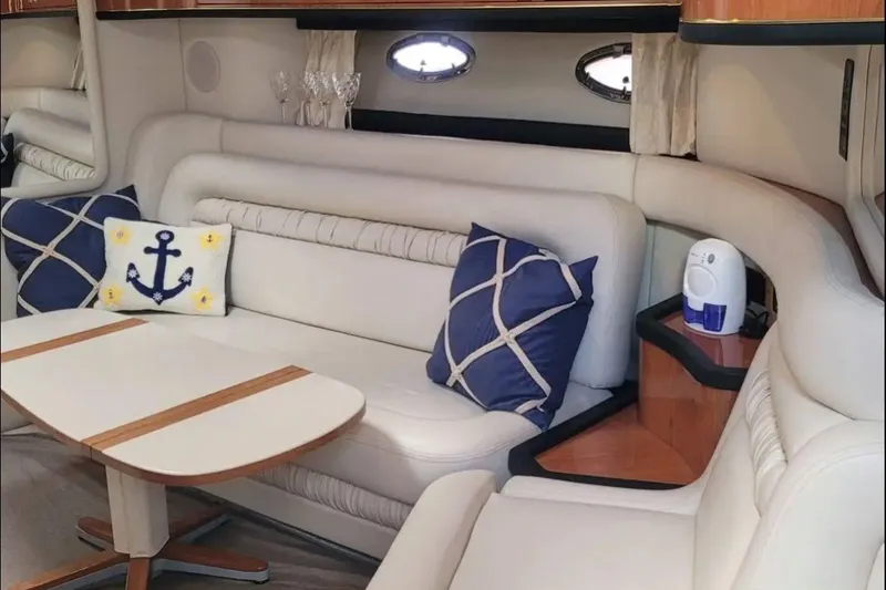 Slide: The Image of Interior of 1999 Sea Ray Sundancer 460 yacht with elegant seating and nautical decor. - 6