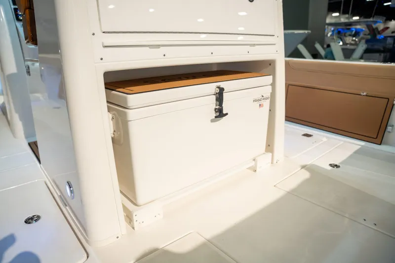Slide: The Image of Caymas 29 CT 2027 boat with built-in cooler compartment. - 16
