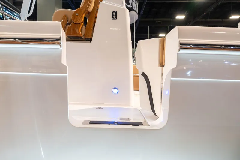 Slide: The Image of Caymas 29 CT 2027 boat step with LED lighting. - 20
