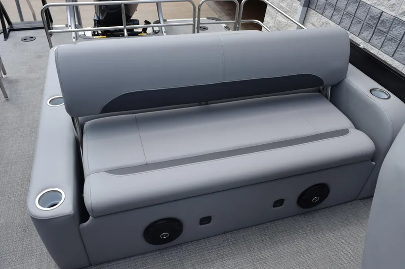 Slide: The Image of 2026 Bentley Pontoons Legacy 243 Swingback with sleek gray seating and integrated cup holders. - 10