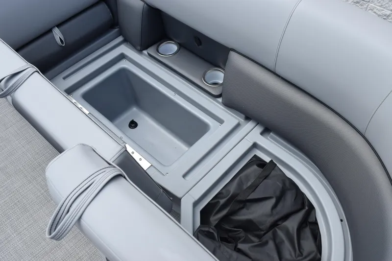Slide: The Image of 2026 Bentley Pontoons Legacy 243 Swingback interior storage and seating area. - 15