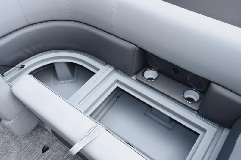 Slide: The Image of 2026 Bentley Pontoons Legacy 243 Swingback interior seating with cup holders and storage. - 17