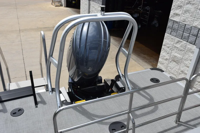 Slide: The Image of 2026 Bentley Pontoons Legacy 243 Swingback with sleek outboard motor and sturdy railing. - 19