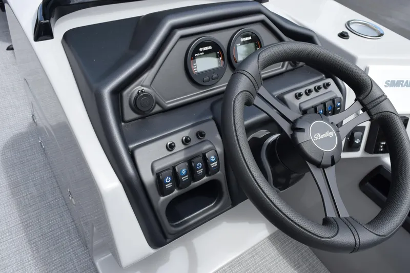 Slide: The Image of Steering console of 2026 Bentley Pontoons Legacy 243 Swingback with modern controls and gauges. - 23