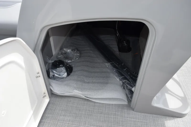 Slide: The Image of Storage compartment in 2026 Bentley Pontoons Legacy 243 Swingback boat. - 24