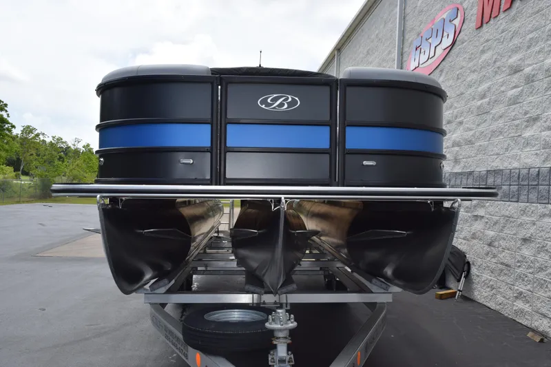 Slide: The Image of 2026 Bentley Pontoons Legacy 243 Swingback on trailer, showcasing sleek design and modern features. - 3