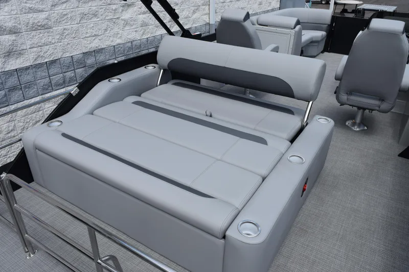Slide: The Image of 2026 Bentley Pontoons Legacy 243 Swingback with luxurious gray seating and modern design. - 7