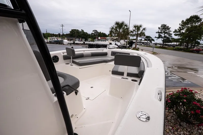 Slide: The Image of 2022 Sea Born LX24 Center Console boat with spacious seating and sleek design. - 12