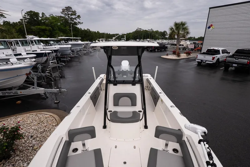 Slide: The Image of 2022 Sea Born LX24 Center Console boat in a dealership lot. - 15