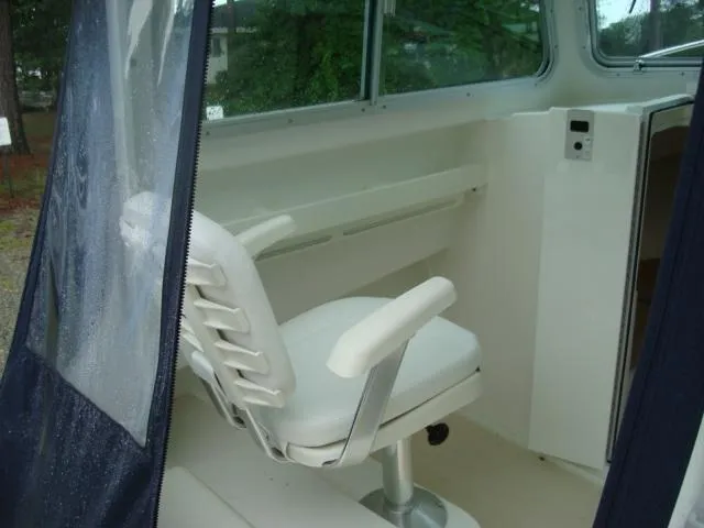 Slide: The Image of Interior of a 2013 Steiger Craft 23 Miami boat with seating. - 4