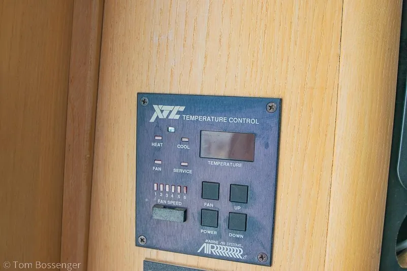 Slide: The Image of Temperature control panel on 1993 Tiara Yachts 4300 Convertible, featuring fan speed and temperature settings. - 32
