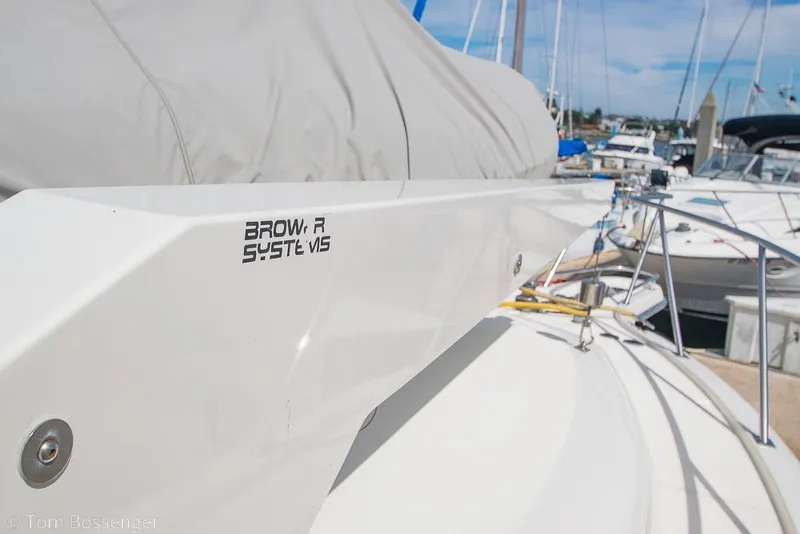 Slide: The Image of Close-up of a 1993 Tiara Yachts 4300 Convertible boat detail at a marina. - 39