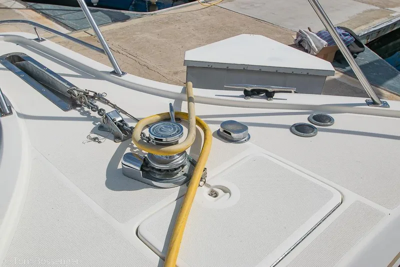 Slide: The Image of Deck of 1993 Tiara Yachts 4300 Convertible with winch and hose. - 51