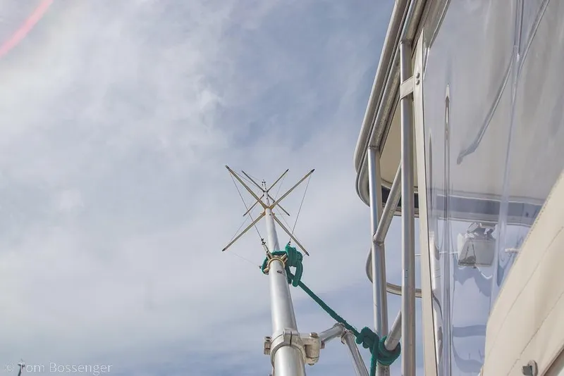 Slide: The Image of Antenna on 1993 Tiara Yachts 4300 Convertible against a clear sky. - 53