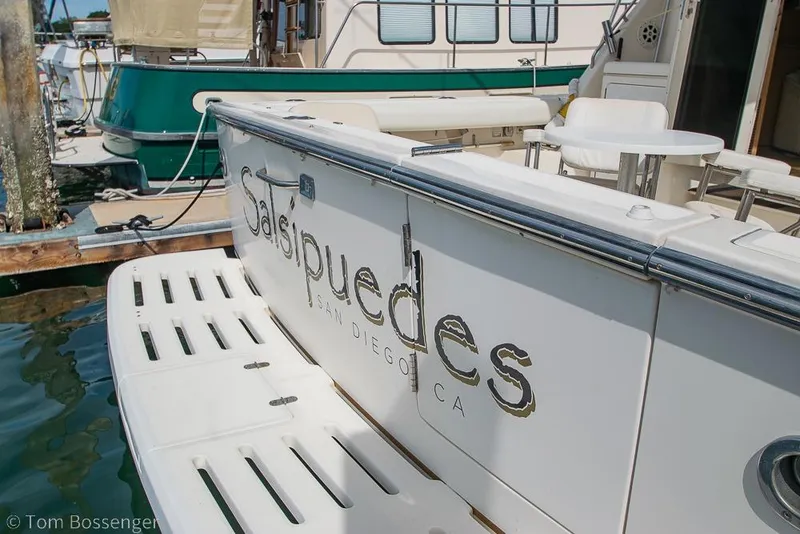 Slide: The Image of 1993 Tiara Yachts 4300 Convertible docked, featuring "Salsipuedes" nameplate, San Diego, CA. - 54