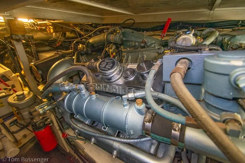 Slide: The Image of Engine room of a 1993 Tiara Yachts 4300 Convertible, showcasing Detroit Diesel components. - 56
