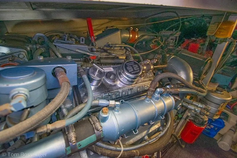 Slide: The Image of Engine room of a 1993 Tiara Yachts 4300 Convertible, featuring Detroit Diesel components. - 57