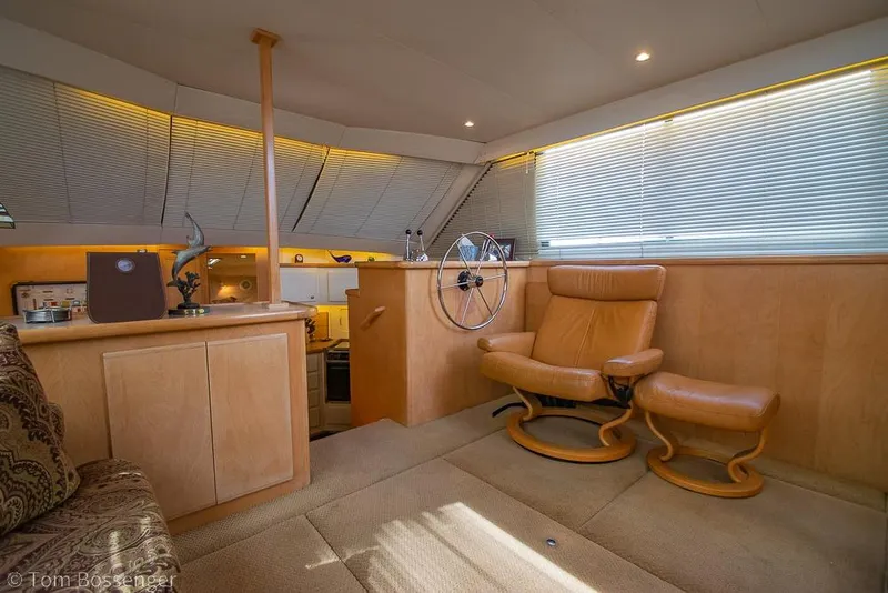 Slide: The Image of Luxurious interior of 1996 Carver 370 Aft Cabin Motor Yacht with leather seating. - 11