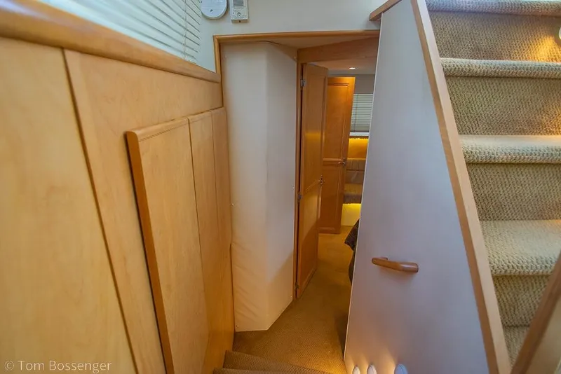 Slide: The Image of Interior of 1996 Carver 370 Aft Cabin Motor Yacht with stairs and hallway. - 22
