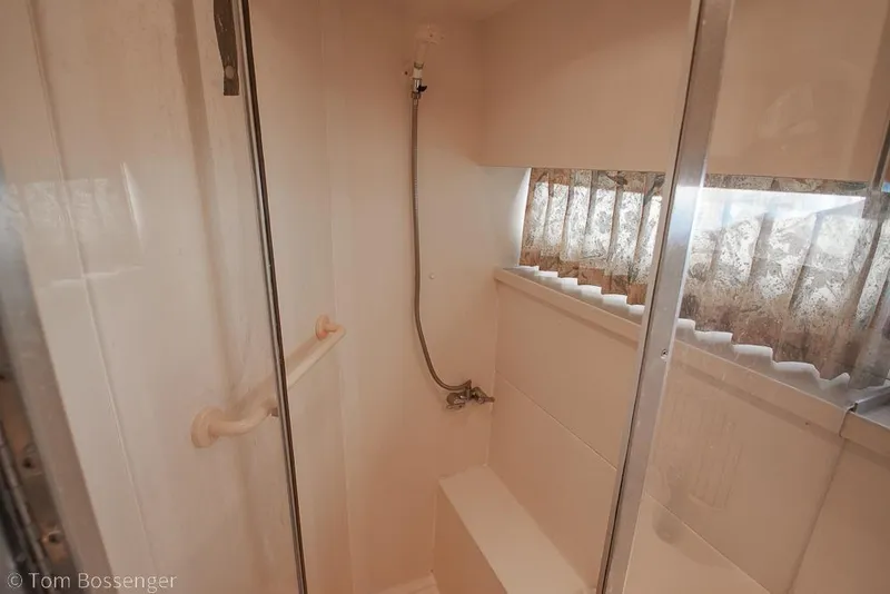Slide: The Image of Shower area in 1996 Carver 370 Aft Cabin Motor Yacht with curtain and grab bar. - 28