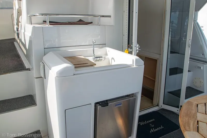 Slide: The Image of 1996 Carver 370 Aft Cabin Motor Yacht interior with sink and welcome mat. - 36