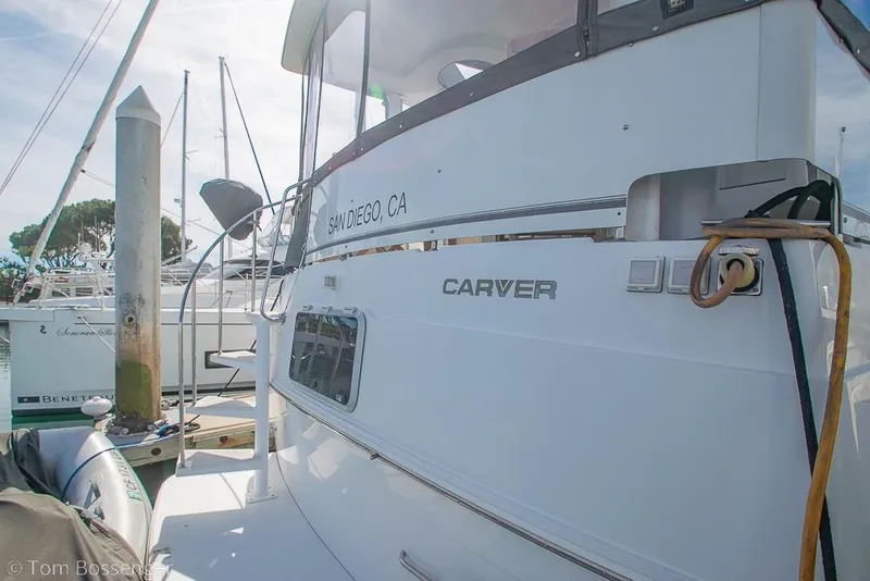 Slide: The Image of 1996 Carver 370 Aft Cabin Motor Yacht docked in San Diego marina. - 46