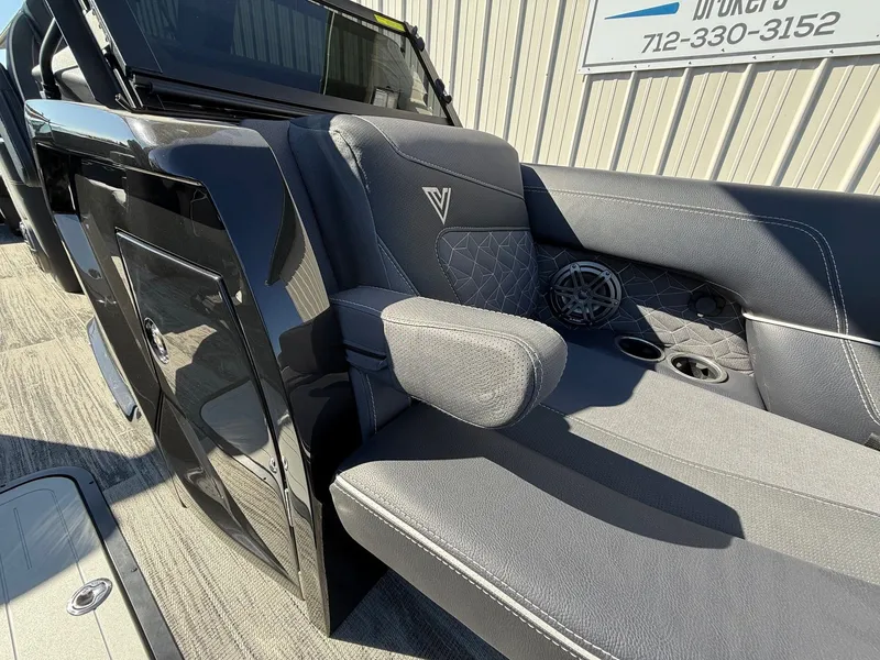 Slide: The Image of 2024 Viaggio Diamante boat with luxurious gray seating and speakers. - 19
