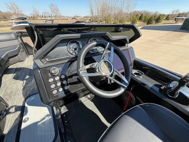 Slide: The Image of Interior view of 2024 Viaggio Diamante boat cockpit with steering wheel. - 22