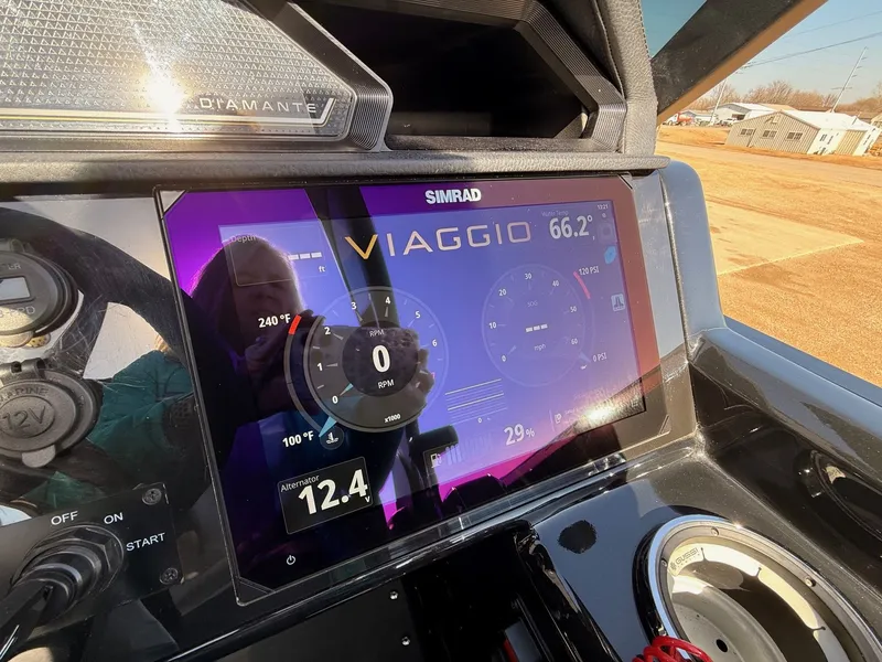 Slide: The Image of Viaggio Diamante 2024 dashboard with Simrad display and controls. - 25